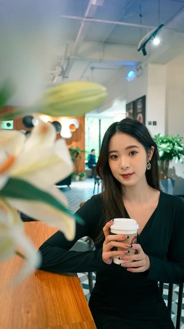 A creator sharing a moment at a cafe